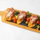 Brusketi sa pršutom i parmezanom