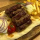 Ćevapi uz prilok pomfrit ili wedžis krompir